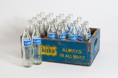 Kirks glass bottles in a box