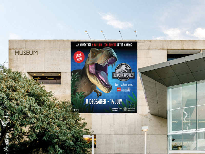 Queensland Museum building with Jurassic World by Brickman banner