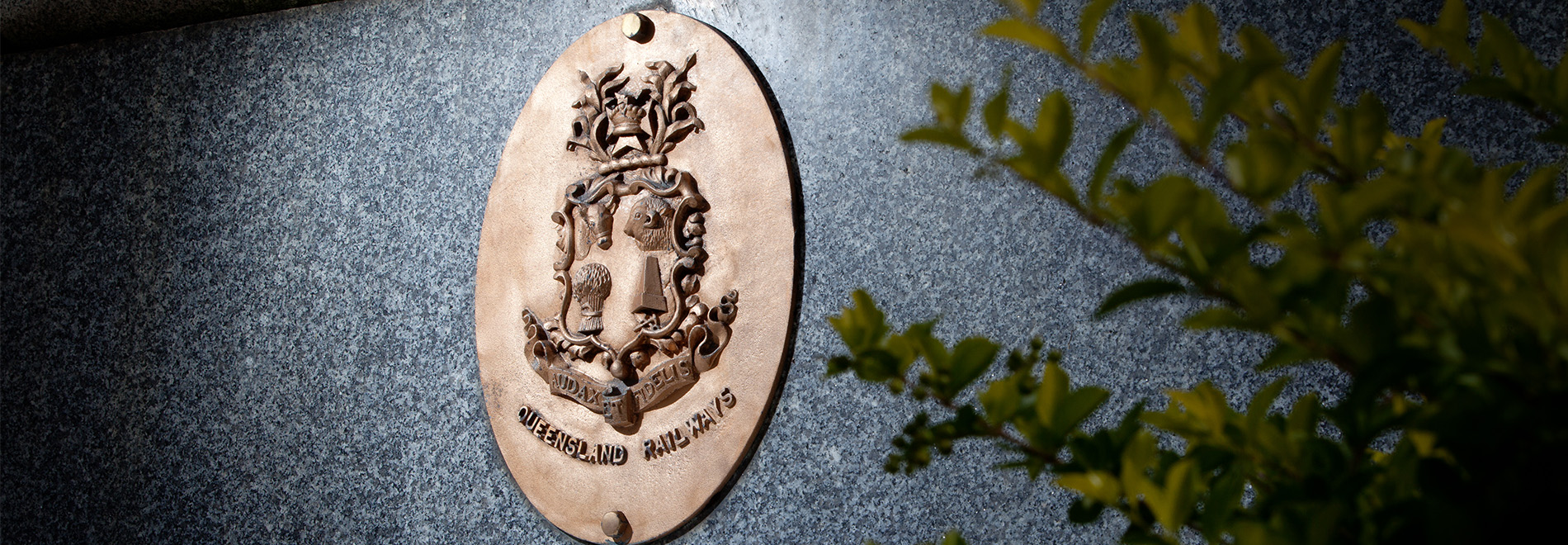 War memorial bronze sign